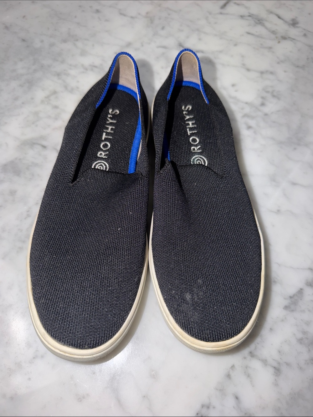 Rothy's women  Black Knit Slip-On Sneakers with Blue Trim